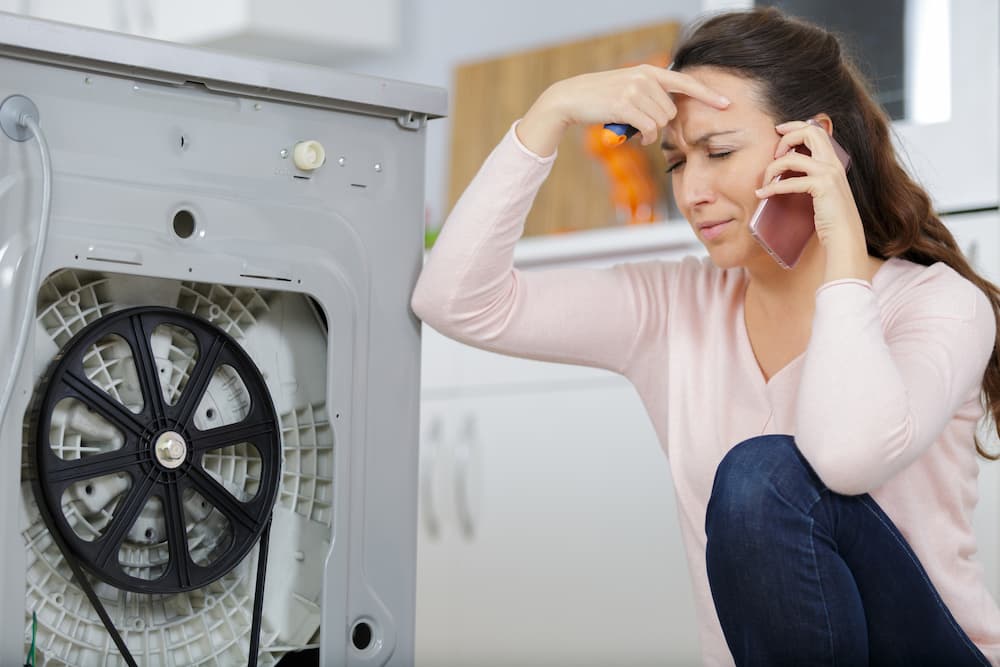 woman calling white goods guys